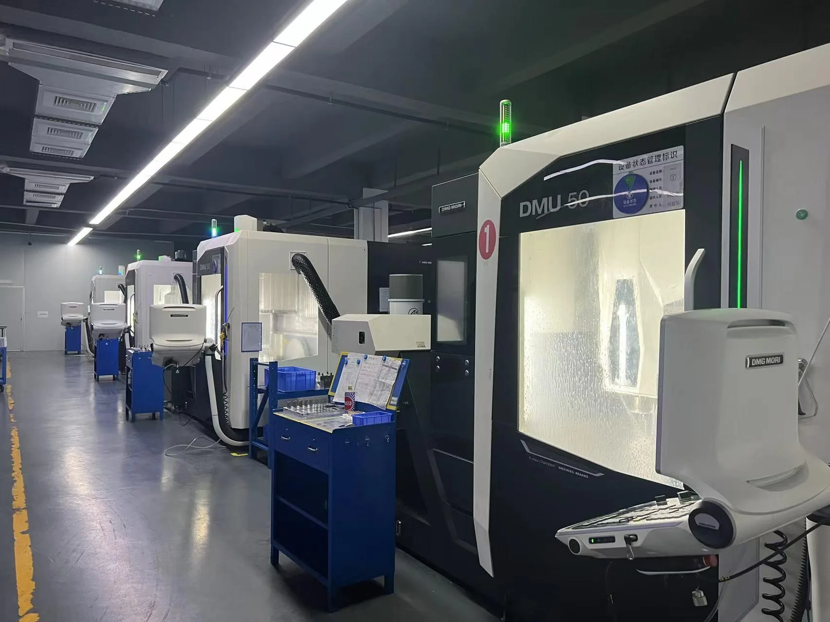 DMG MORI DMU 50 five-axis machining centers in the production workshop